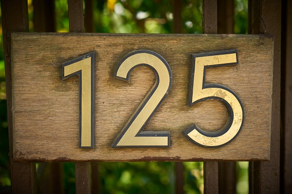 wooden number address sign