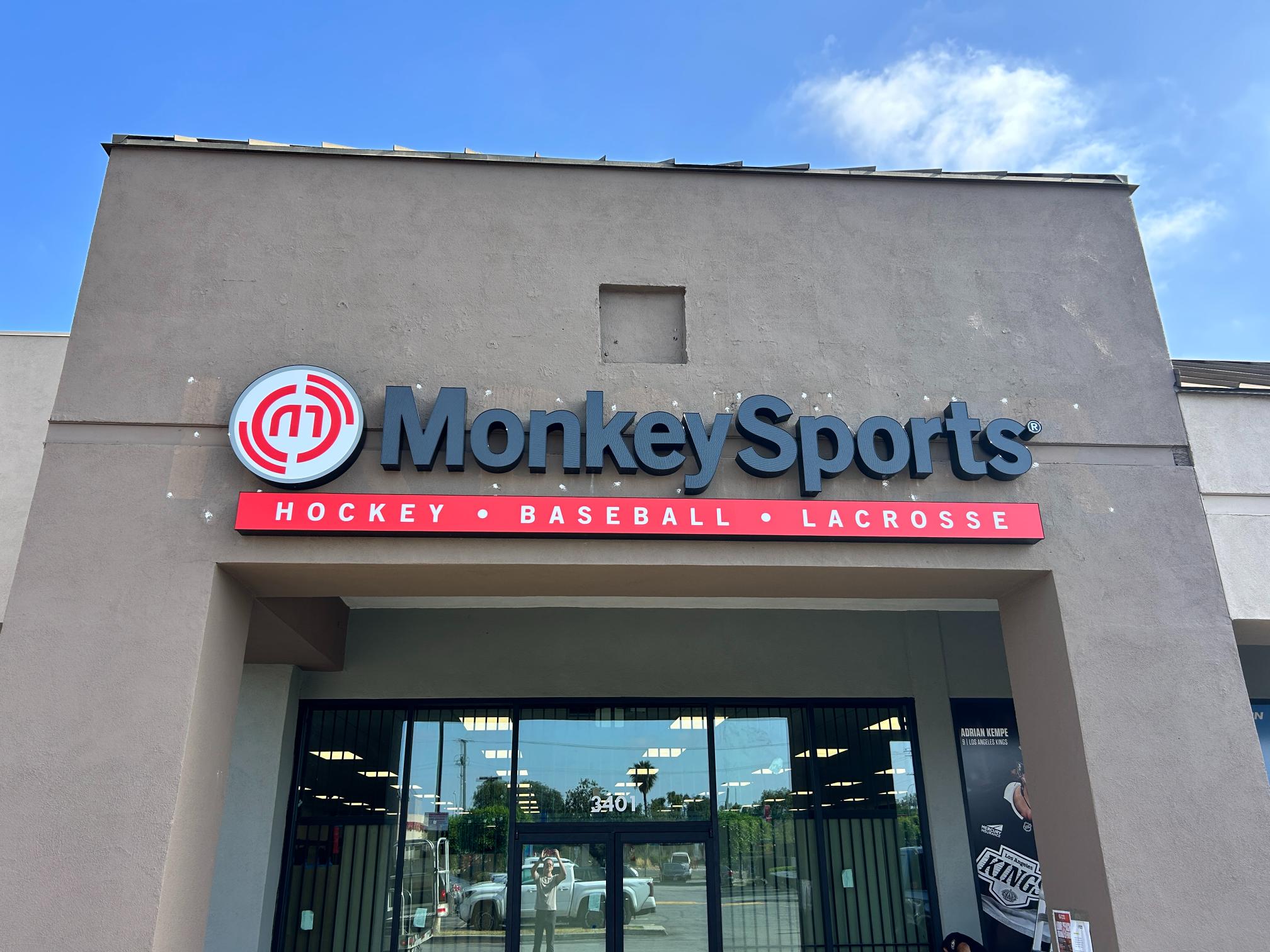 MonkeySports exterior storefront sign installed in Long Beach CA